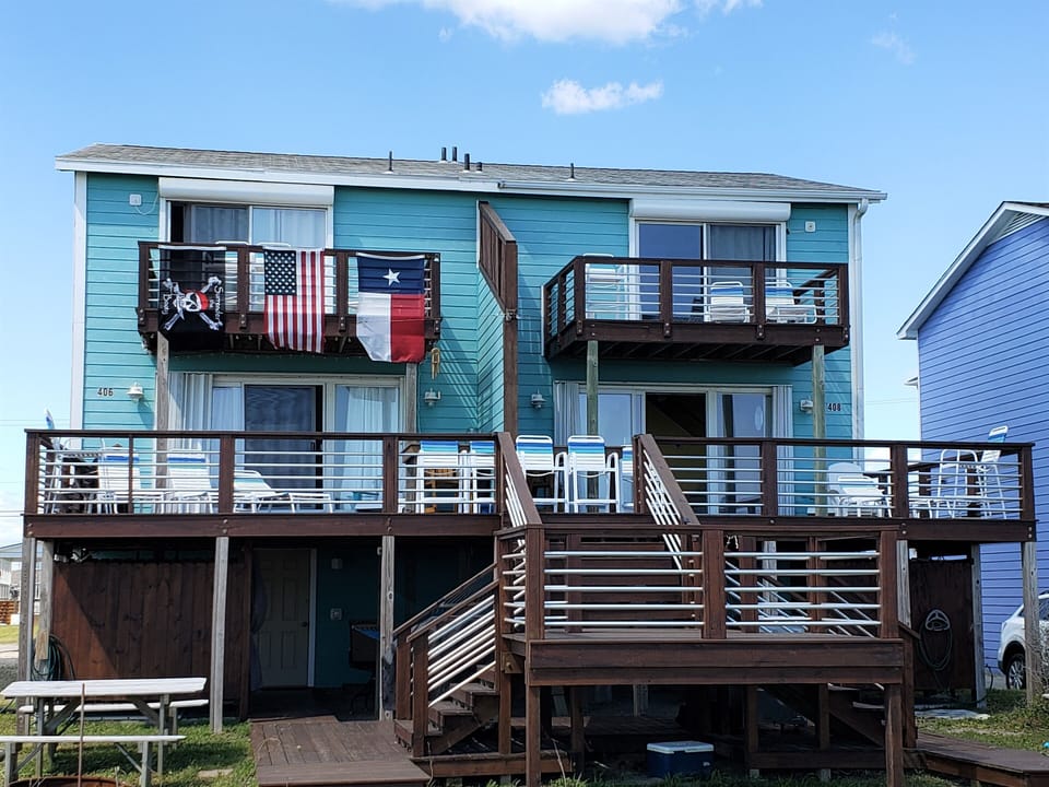 view of house from beach side. Texas flag is gone now....