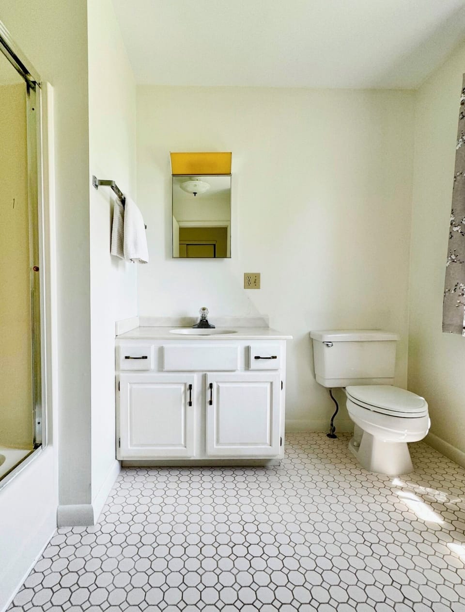 full ensuite bathroom with walk-in shower and tub