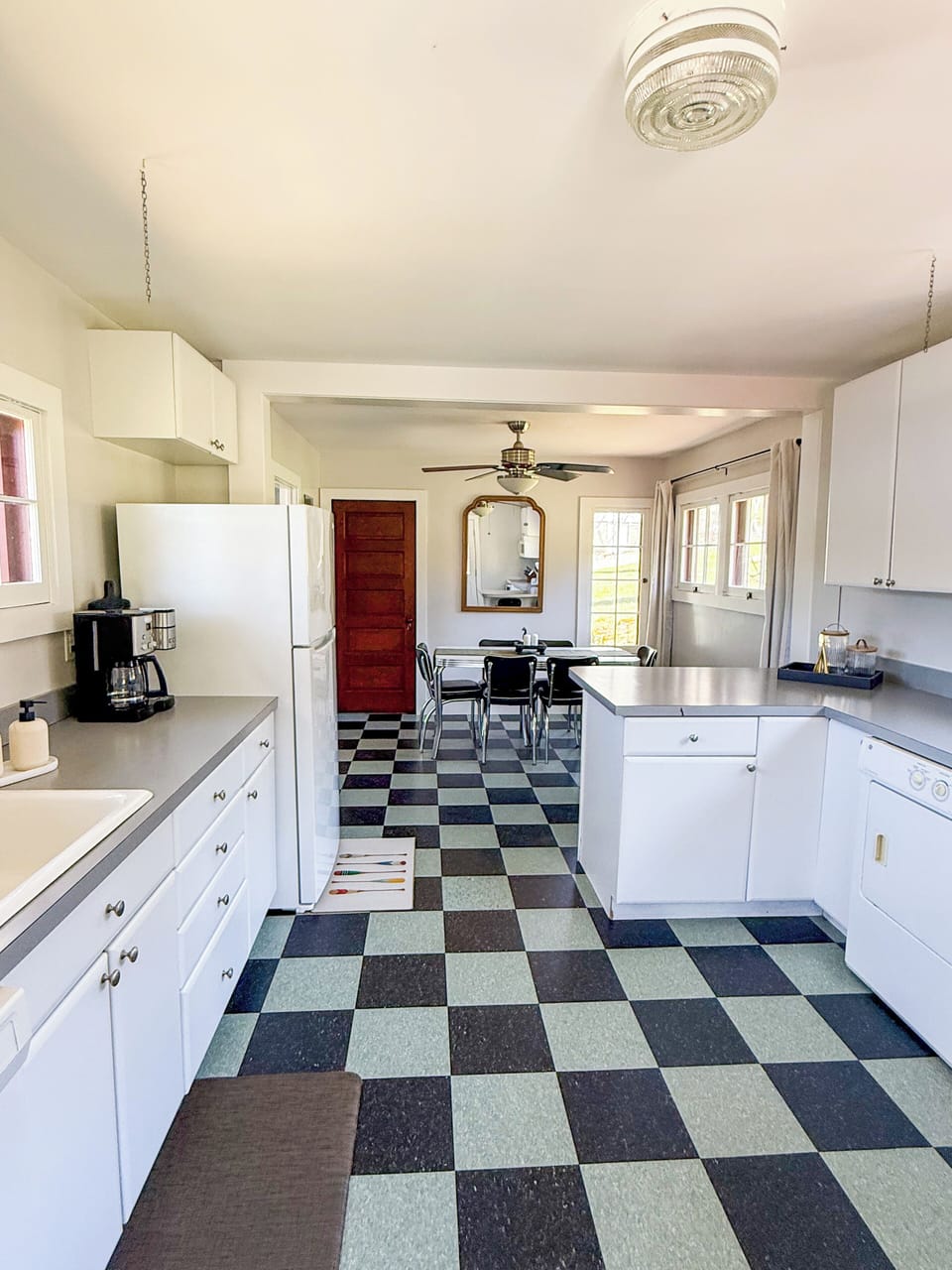 Fully stocked kitchen with dining area.