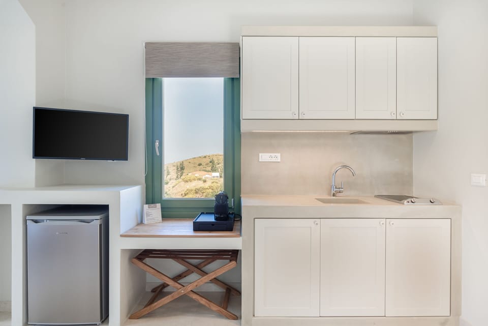 Manoglia Suite | Private kitchen | Fridge, stovetop, espresso maker, coffee/tea maker