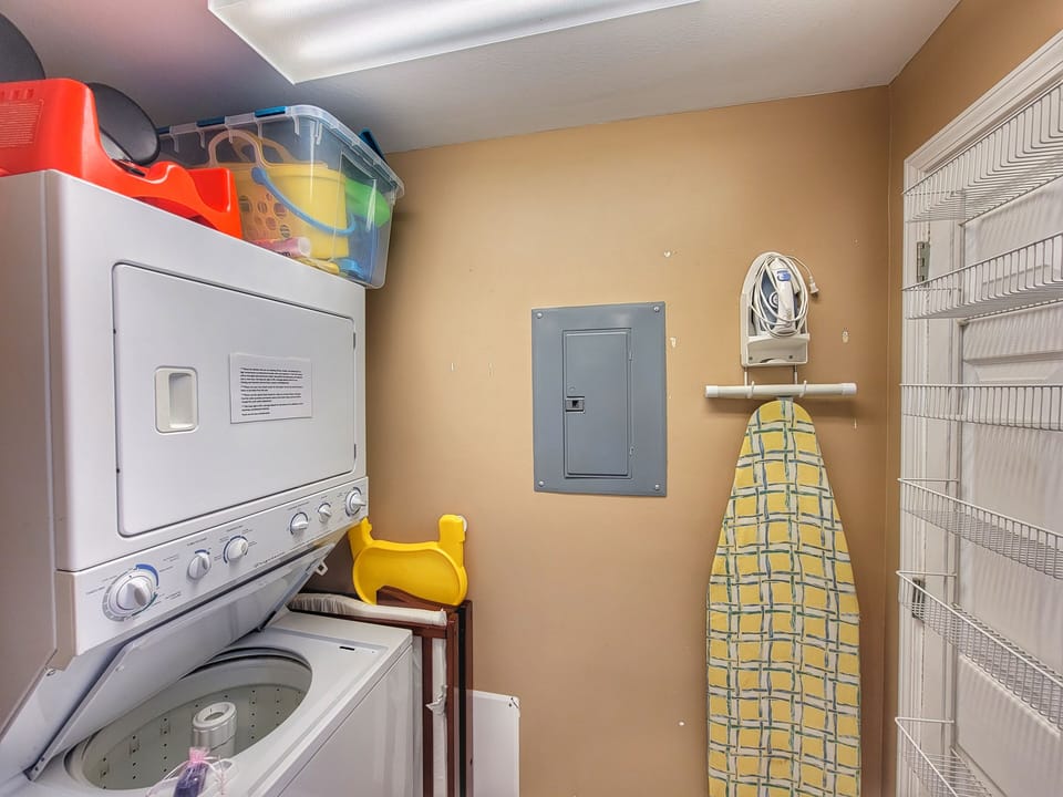 Washer and dryer. Beach toys, booster seat, crib, iron and iron board for you!