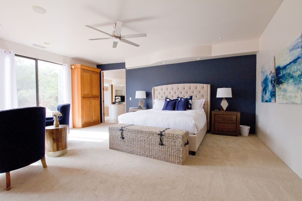 Huge master bedroom with Cal King bed, fire place, TV, and views 