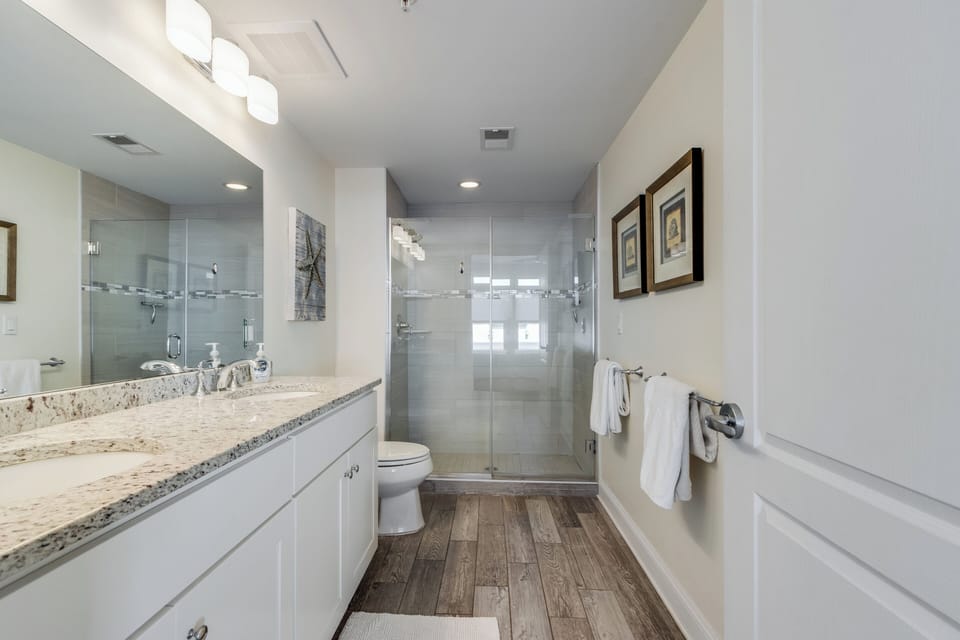 Master bathroom with glass walk-in shower