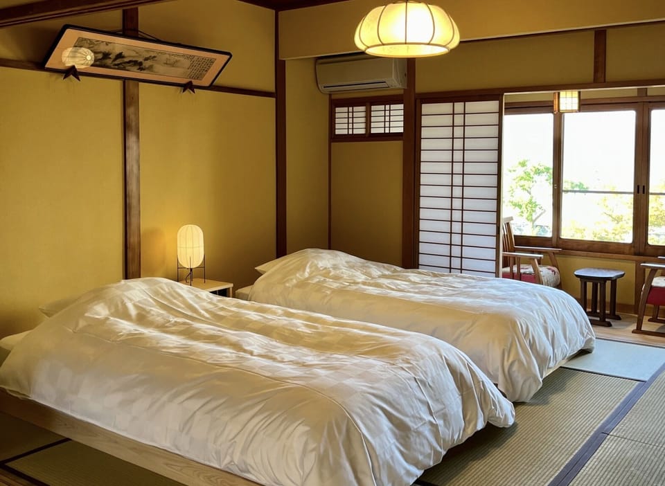 Standard Twin Room, 2 Twin Beds, Non Smoking, Sea View | Minibar, WiFi (free), individually decorated, bed sheets