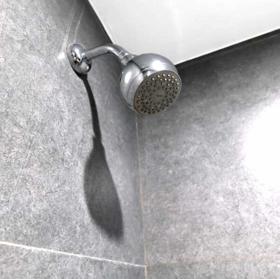 Shower, slippers, towels, soap