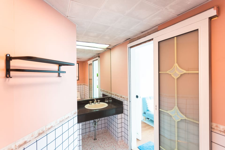 Panoramic Condo (Chinese Domestic Guests Only) | Bathroom | Shower, rainfall showerhead, free toiletries, hair dryer