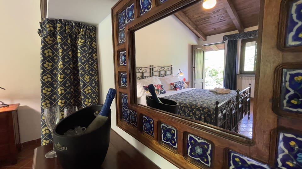 Deluxe Triple Room | Blackout drapes, bed sheets