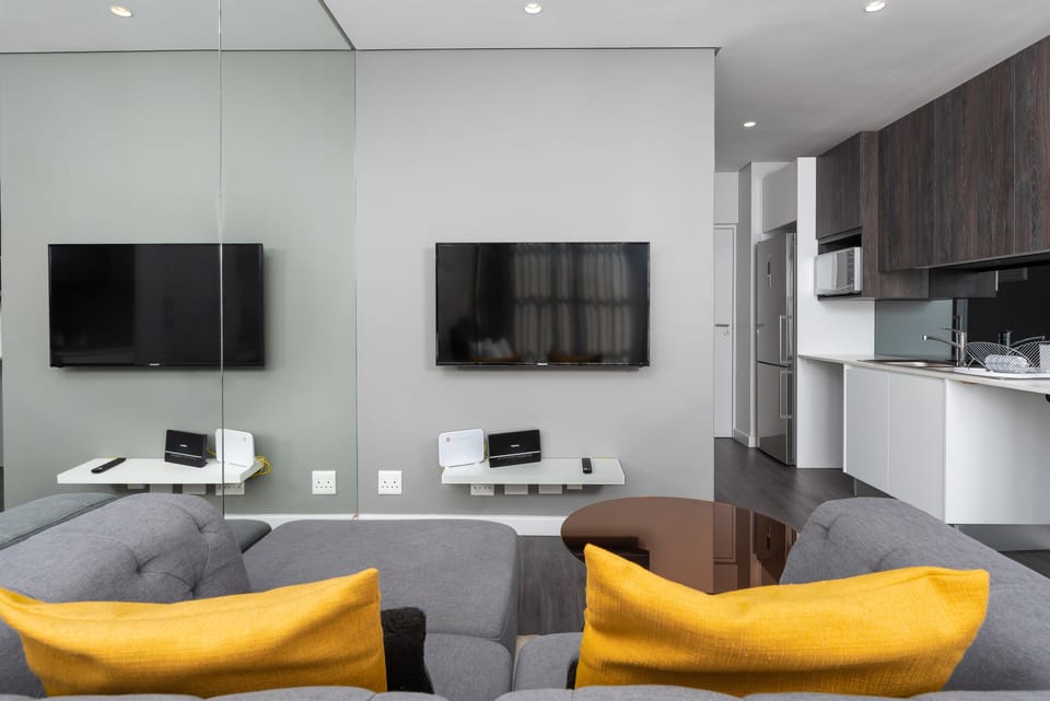 Comfort Studio, City View | Living area | Flat-screen TV