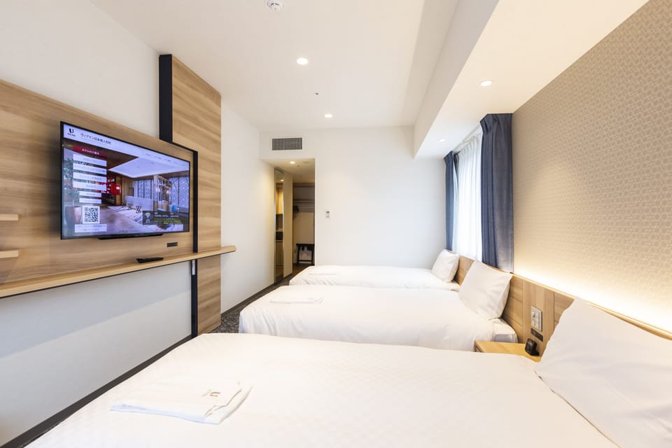 Triple Room | Down comforters, blackout drapes, soundproofing, iron/ironing board