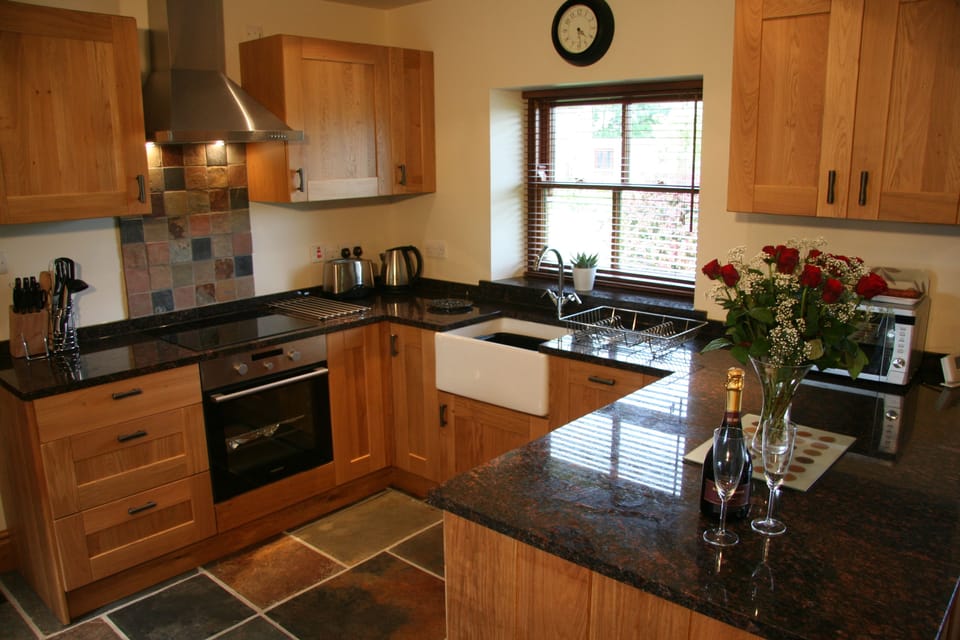Cottage, 2 Bedrooms | Private kitchen | Fridge, dishwasher, coffee/tea maker, electric kettle