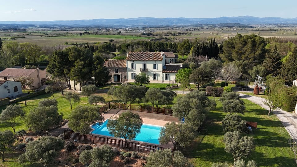 property and pool with black mountains 