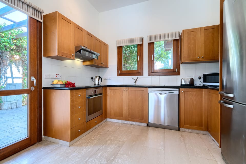 Villa | Private kitchen | Coffee/tea maker, full-size fridge, microwave, oven
