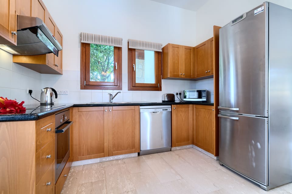 Villa | Private kitchen | Coffee/tea maker, full-size fridge, microwave, oven