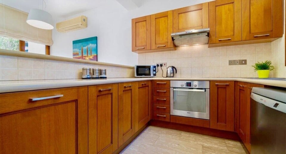 Villa | Private kitchen | Coffee/tea maker, full-size fridge, microwave, oven