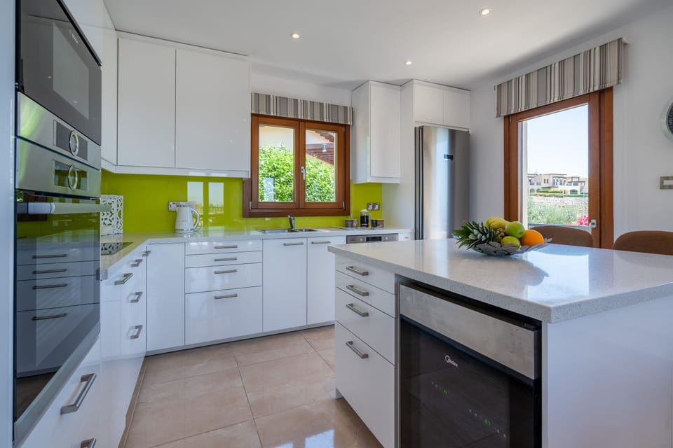 Villa | Private kitchen | Coffee/tea maker, full-size fridge, microwave, oven