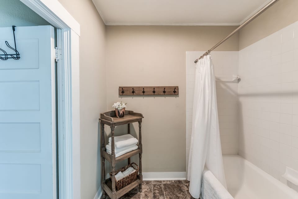 Bathroom has full size Tub/Shower. Clean and roomy!!