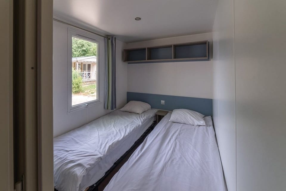 Get a peaceful night sleep in our cozy bedroom with 2 Single beds.