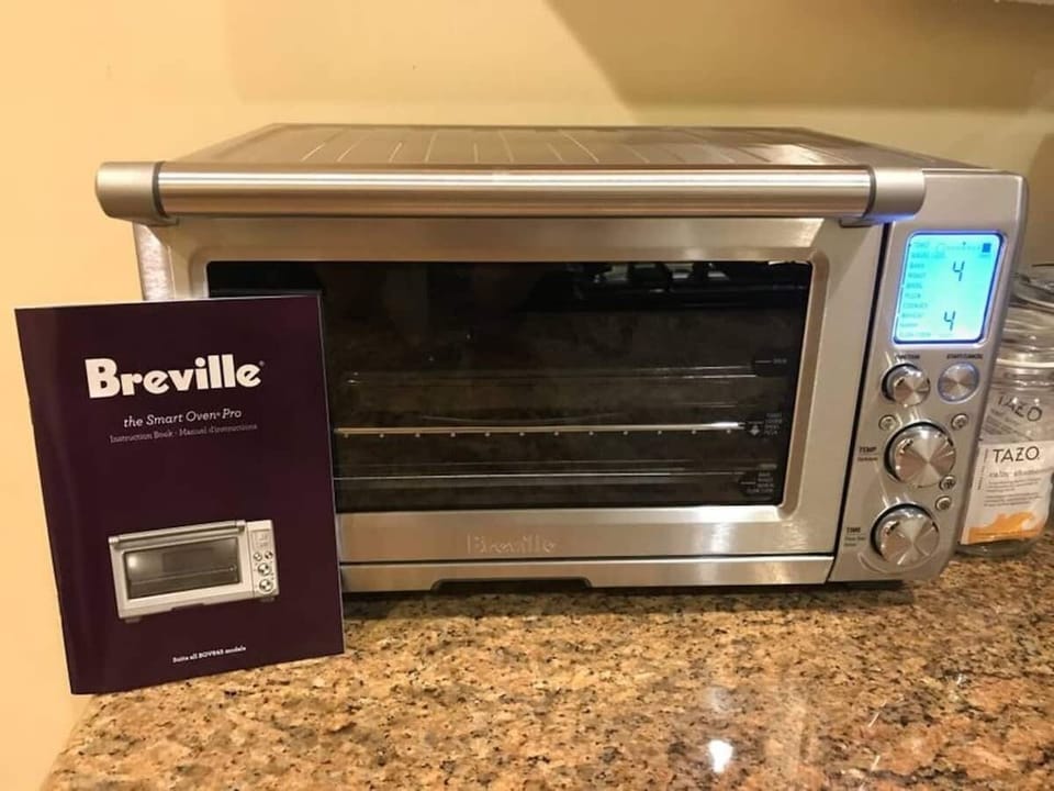 Countertop convection oven is big enough to cook most frozen pizzas and a can handle a variety of other baking needs including cookies when you don't need a  full size oven.