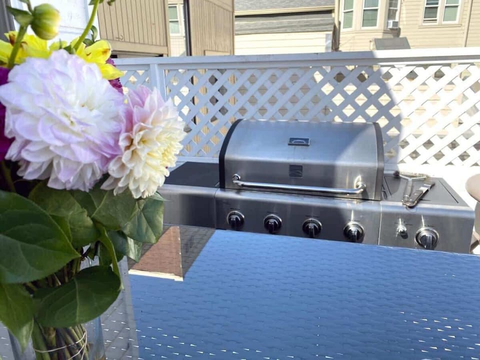 Off the dining room is the outdoor terrace with BBQ grill seats 6... perfect for enjoying  warm days/evenings.  There's a slight view of downtown if you look hard enough...