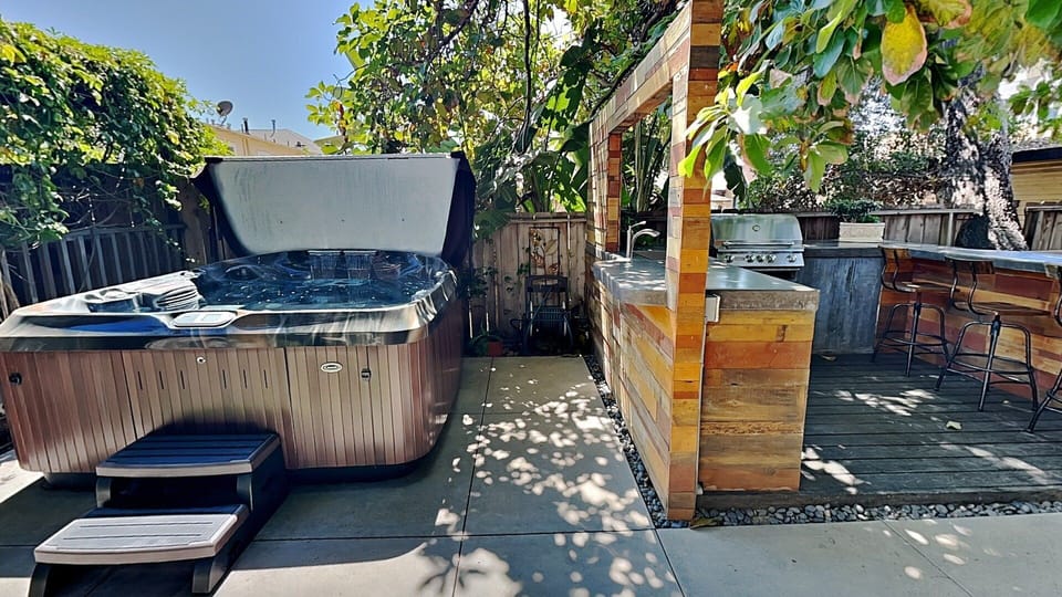 New Jacuzzi in the Beautiful shared Backyard BBQ Area!
Beautiful woodwork and concrete counters in the shared Backyard BBQ Area!