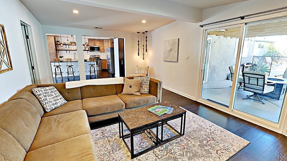 Living Room Sectional, Coffee Table, Large Wall Mounted TV