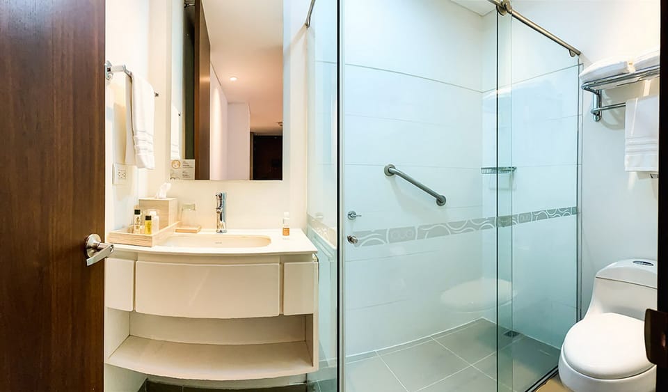 Standard Double Room | Bathroom | Shower, free toiletries, hair dryer, slippers