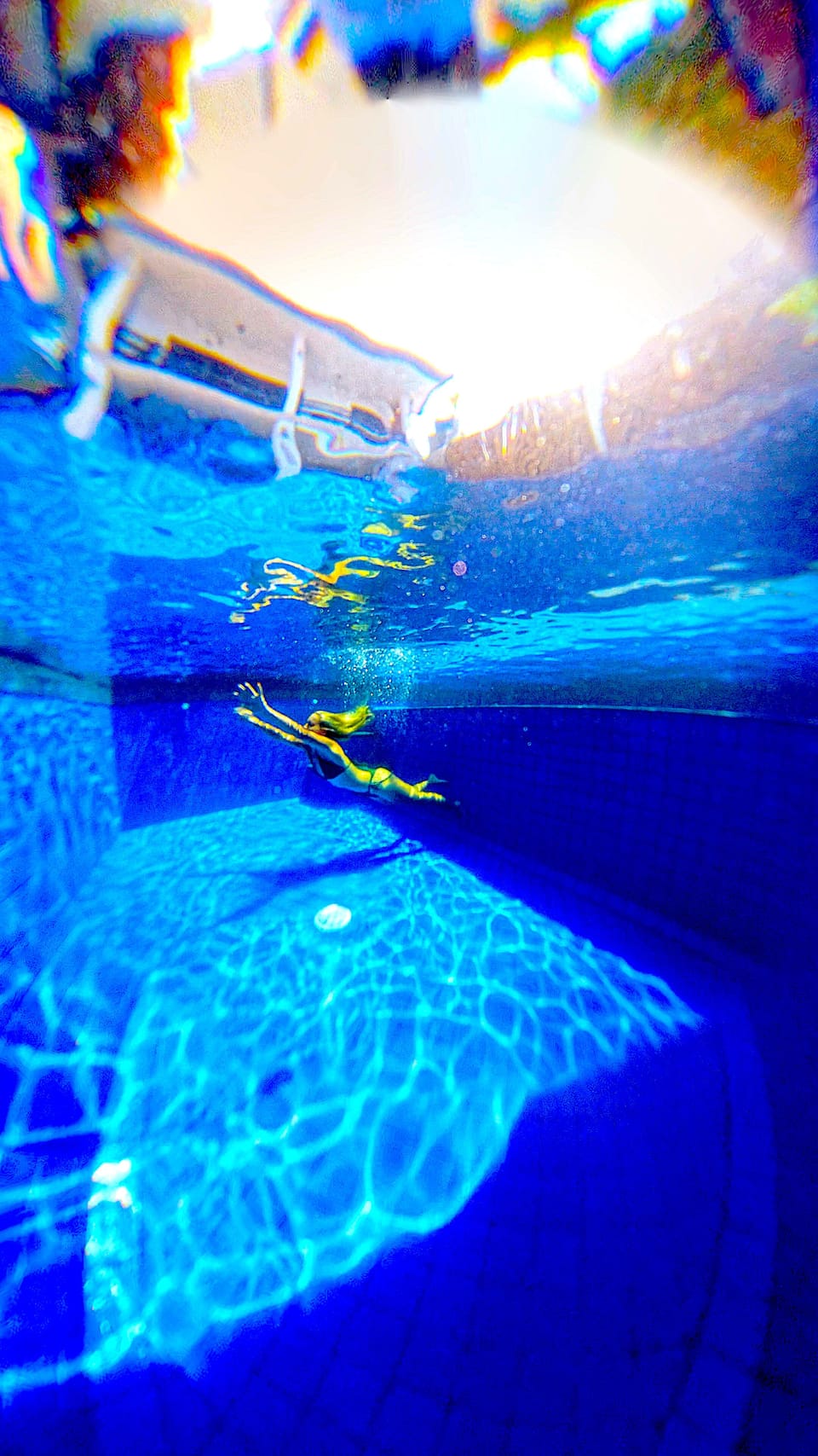Outdoor pool, open 7:00 AM to 10:00 PM, sun loungers