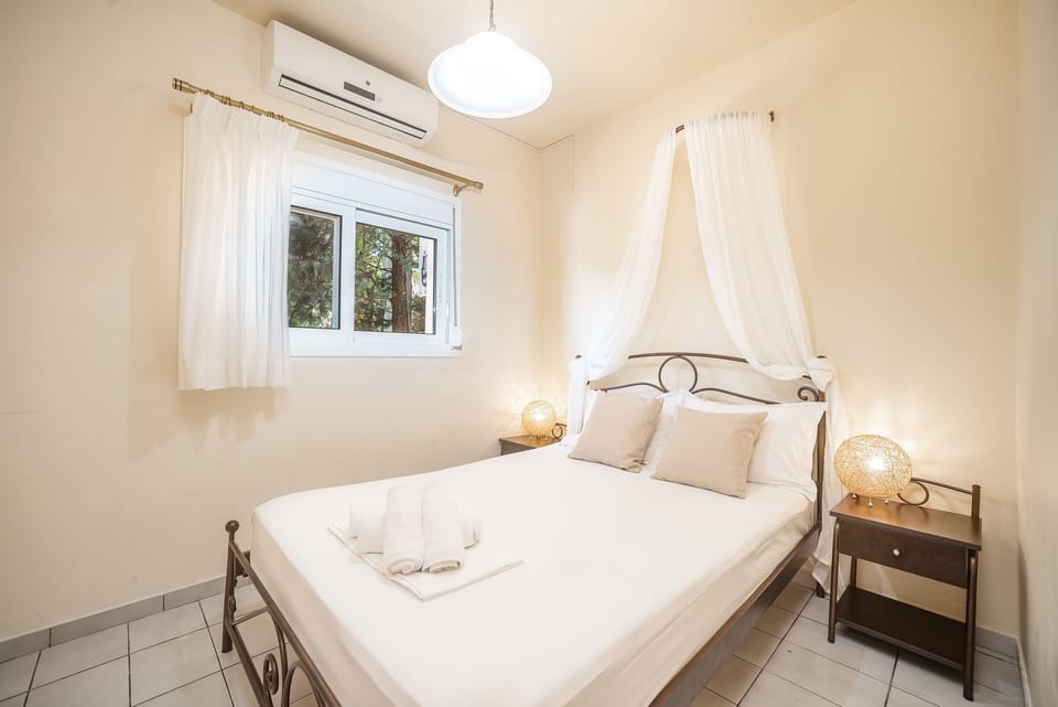 Bedroom 3 on the ground floor with double bed.
