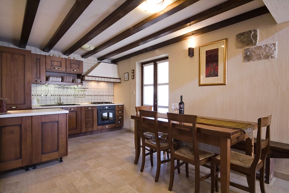 Villa | Private kitchen | Coffee/tea maker, full-size fridge, microwave, oven