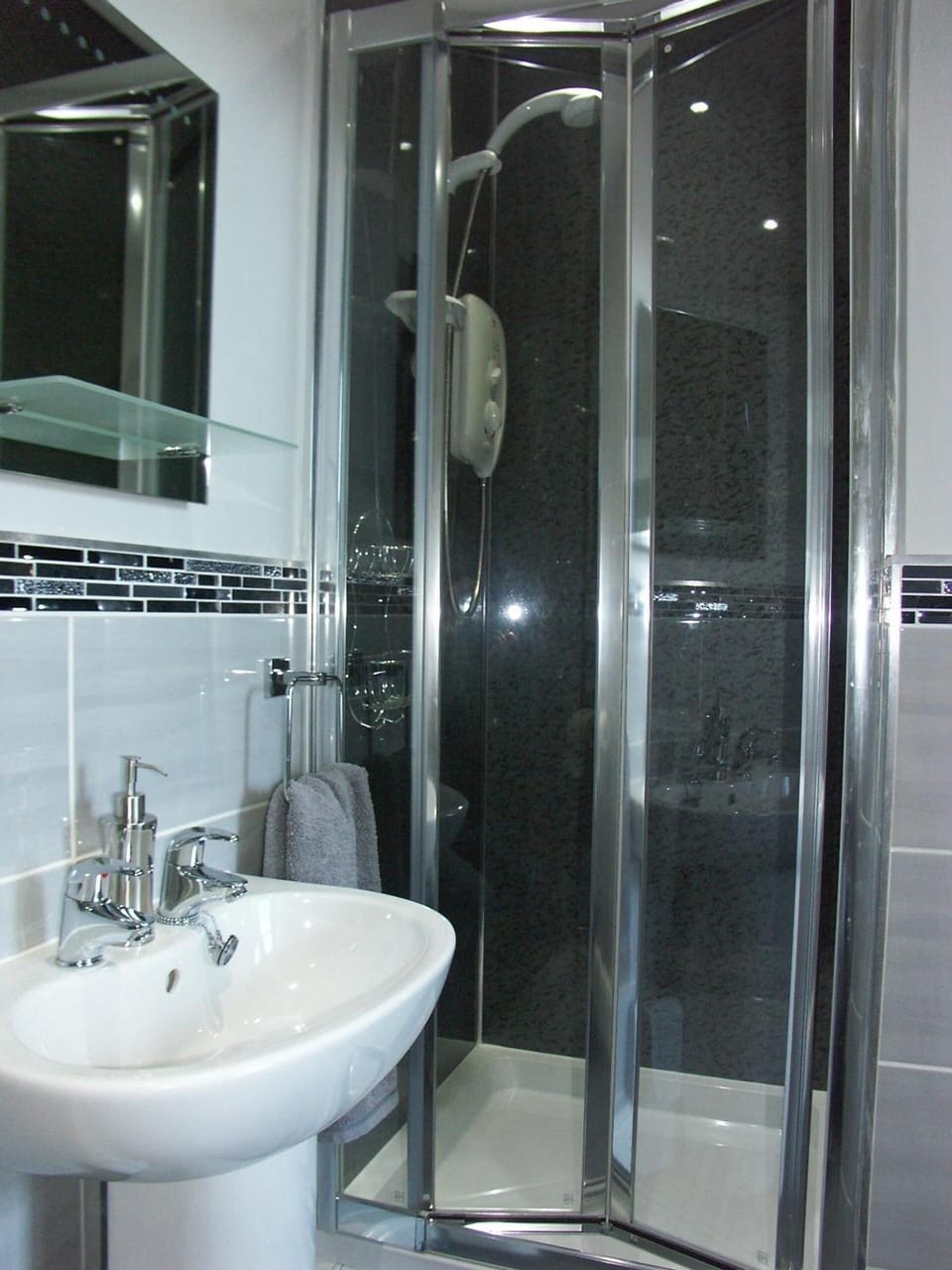Shower, free toiletries, hair dryer, towels