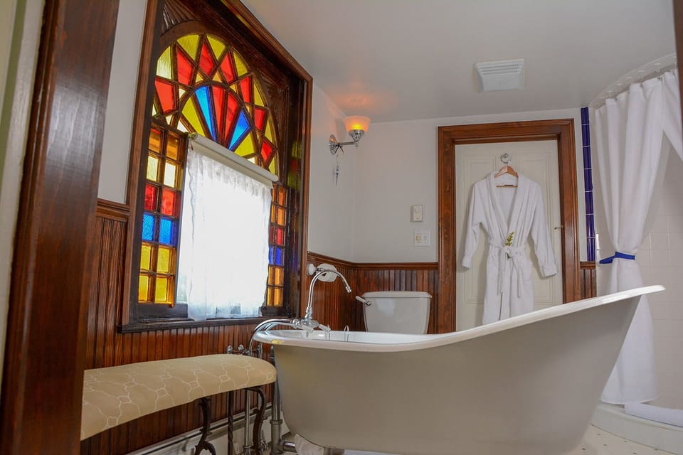 The Towers Suite | Bathroom | Separate tub and shower, hair dryer, bathrobes, towels