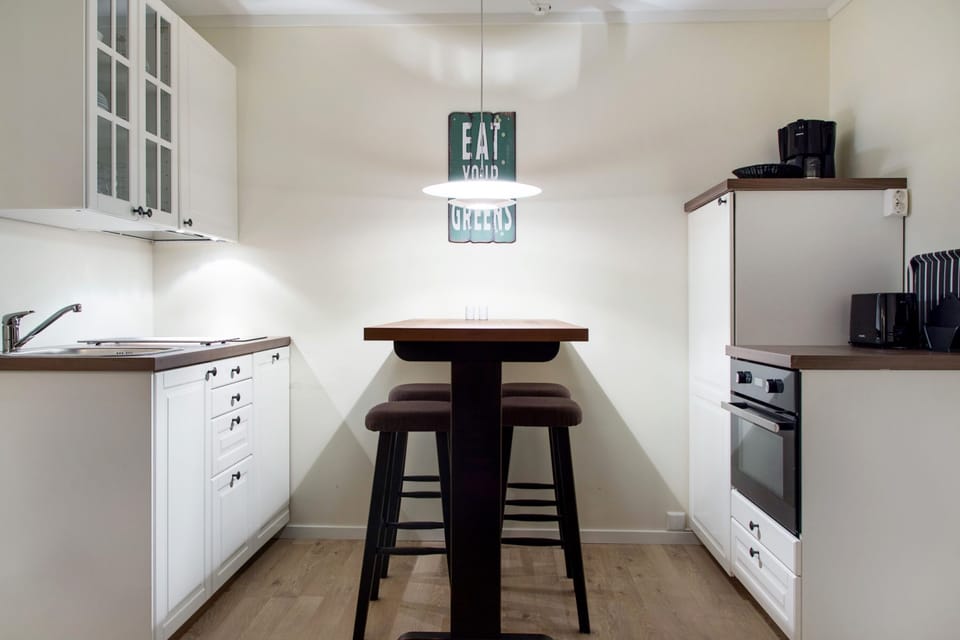 Family Apartment, 2 Bedrooms, Garden Area | Private kitchen | Coffee/tea maker, full-size fridge, microwave, oven