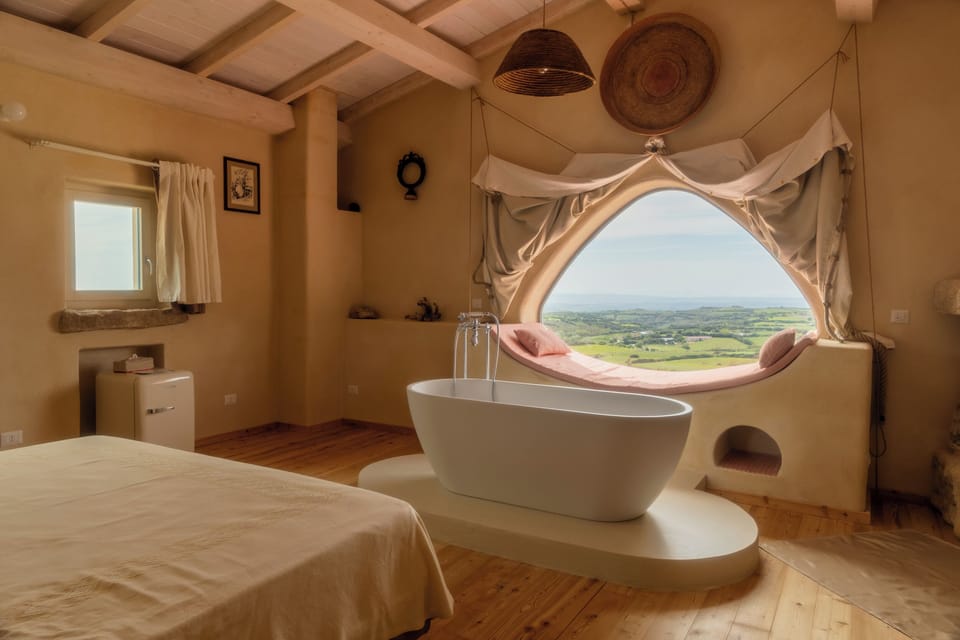 Junior Double Room, Fireplace, Pool View | Premium bedding, down comforters, individually decorated