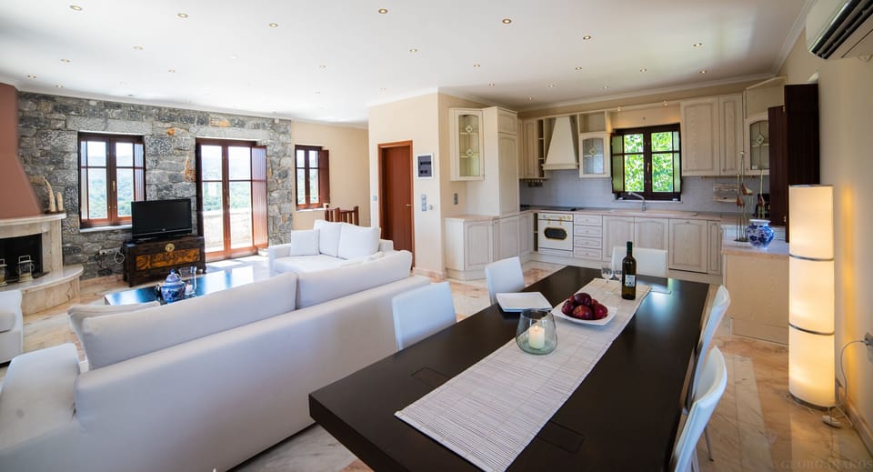 Third-floor luxury saloon with fireplace, dining room, kitchen, and toilet