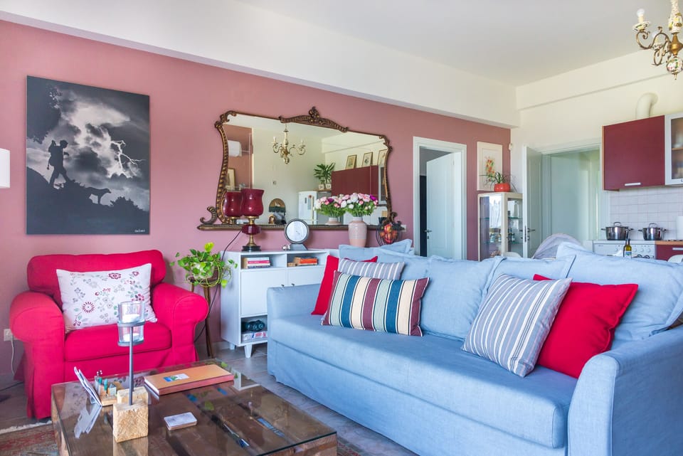 The living room has ample space for dining and relaxing. The sofa bed can accommodate a further 2 persons