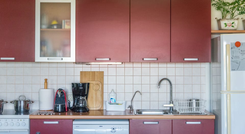 A fully equipped kitchen with oven, microwave, washing machine, kettle, filtered coffee and Nespresso machine