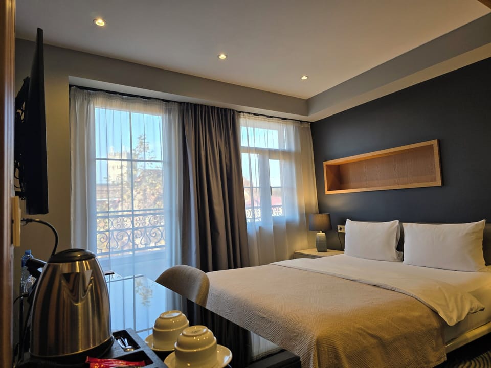 Economy Double Room With Balcony | Premium bedding, minibar, in-room safe, desk