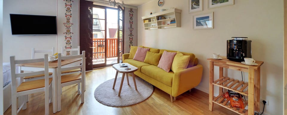 Apartment, Sauna | Living area | Flat-screen TV