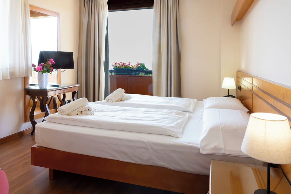 Family Room, Connecting Rooms | Minibar, in-room safe, blackout drapes, WiFi (free)