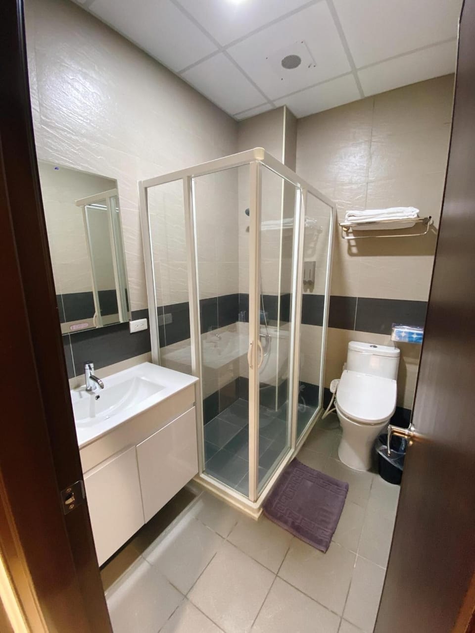 Shower, free toiletries, hair dryer, slippers