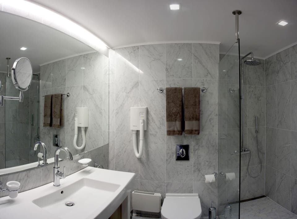 Standard Apartment, Sea View | Bathroom | Shower, designer toiletries, hair dryer, bathrobes