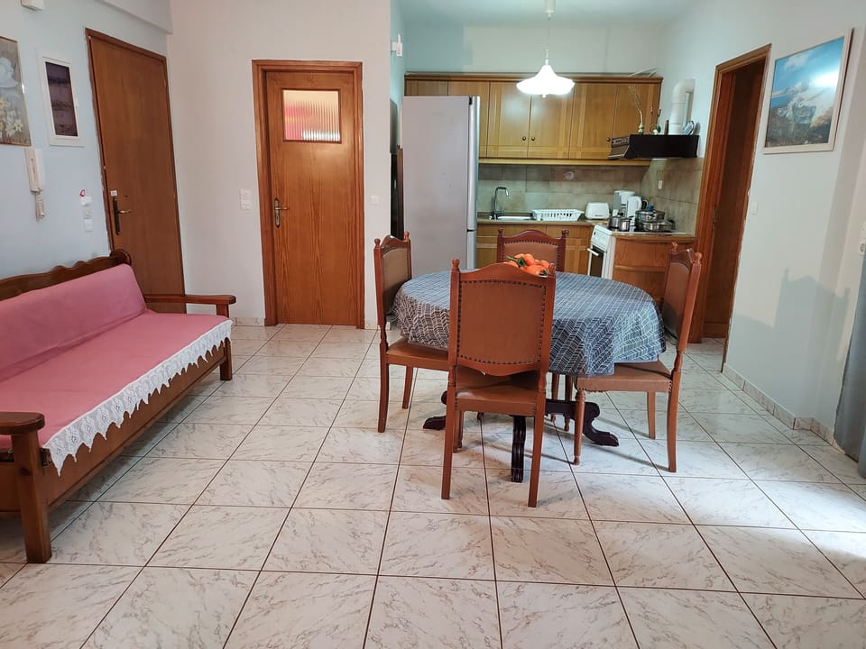 Apartment, 2 Bedrooms, Balcony, Garden View | Living area | Flat-screen TV