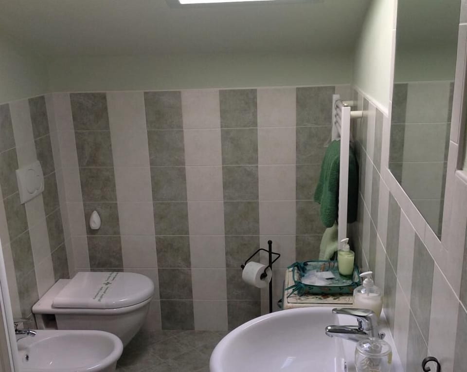 Family Room, Hill View (La Langa) | Bathroom | Shower, free toiletries, slippers, bidet