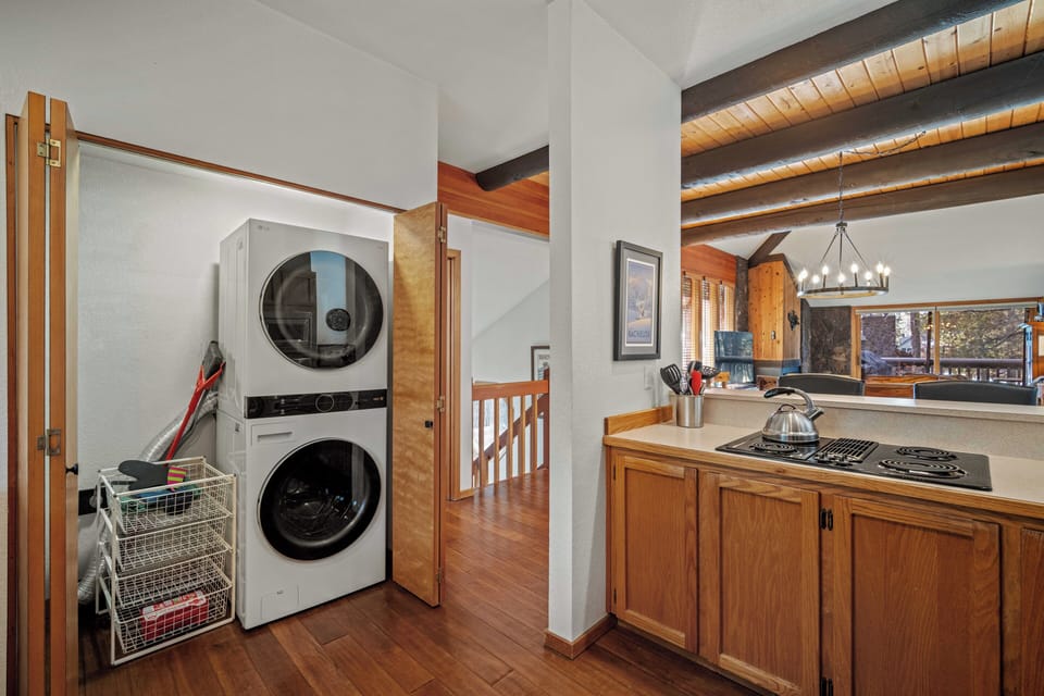 Your laundry stays fresh with convenient in-unit washer and dryer, perfectly integrated into your spacious kitchen area.