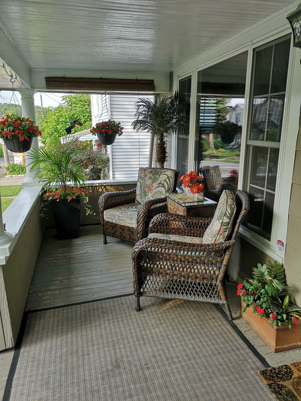 Comfortable sitting area on front porch.