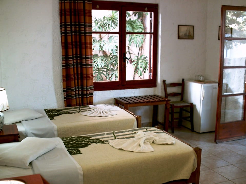 Twin bedded room with private facilities