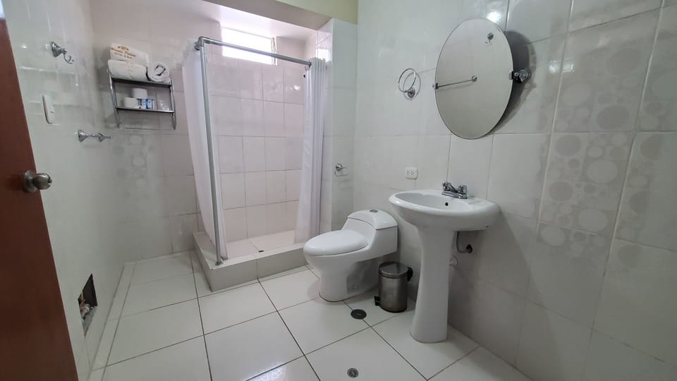 Family Quadruple Room | Bathroom | Bathtub, towels