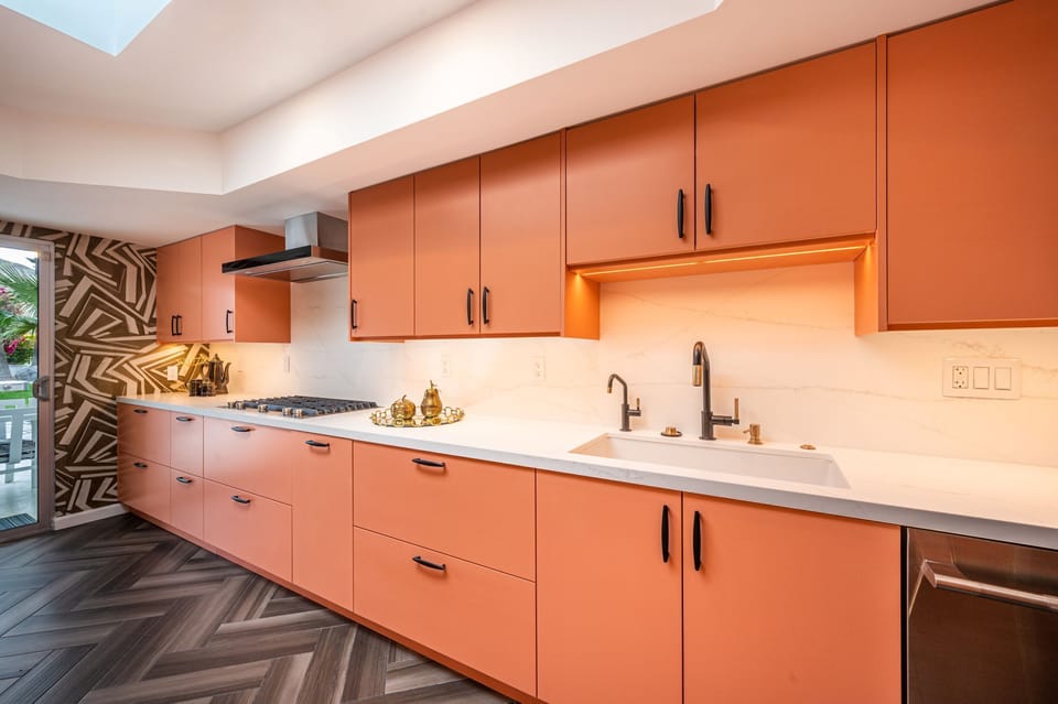 Kitchen Features JennAir Appliances, Large Skylight and Breakfast Nook
