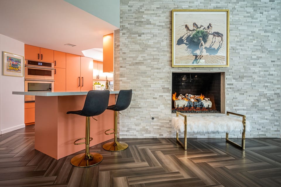 Kitchen is Adjacent to Family Room with Fireplace