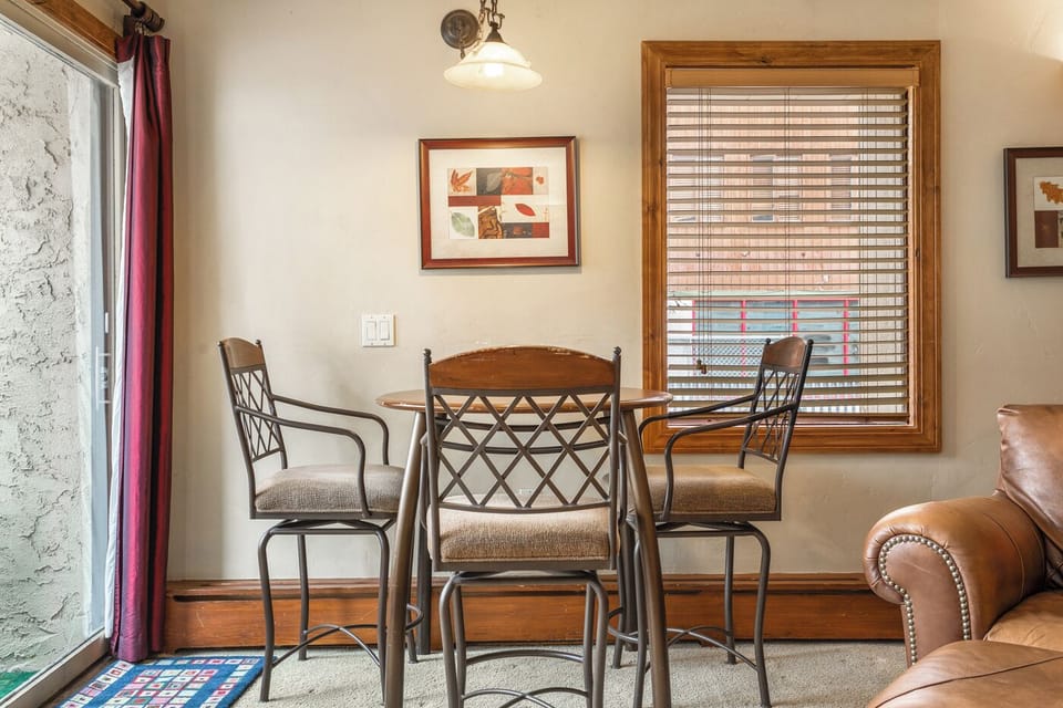 Dining area next to the balcony overlooking the mountain and Lionshead Village!